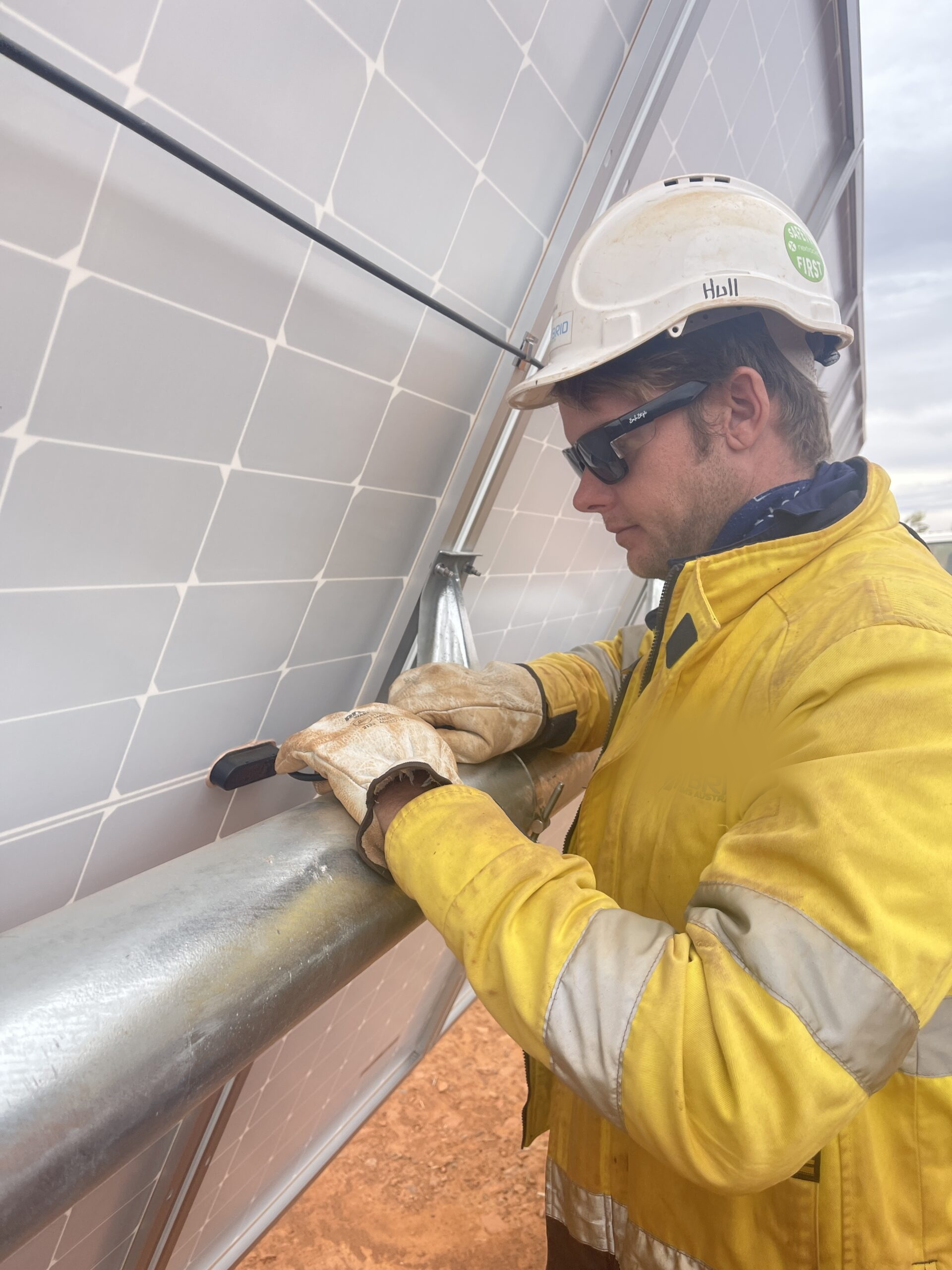 Tactical Energy technician working on solar equipment